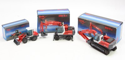 Lot 1061 - A collection of O&K 1/50 scale earth moving...