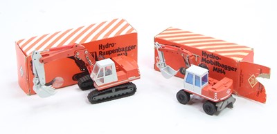 Lot 1064 - An NZG and Conrad 1/50 scale O&K construction...