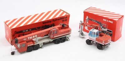 Lot 1067 - An NZG O&K 1/50 scale earth moving and...