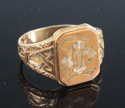 Lot 730 - A gentleman's yellow metal ring (tests as...