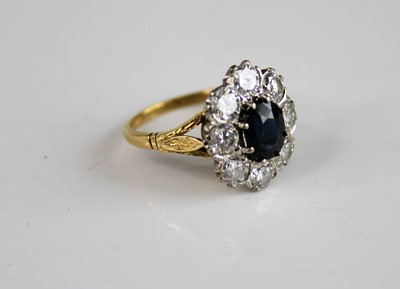 Lot 2183 - A yellow and white metal, sapphire and diamond...