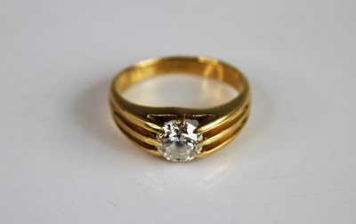 Lot 2186 - An 18ct yellow gold diamond heavy solitaire...