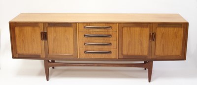 Lot 298 - A 1960s G-Plan 'Fresco' teak long sideboard,...