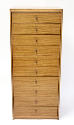 Lot 277 - A 1960s teak narrow chest of ten long drawers,...