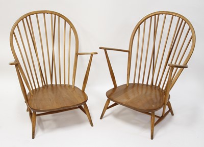 Lot 310 - A pair of 1960s Ercol blond elm stickback open...