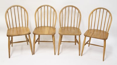 Lot 312 - A matched set of four 1960s Ercol blond elm...