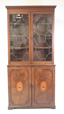 Lot 2409 - A George III mahogany bookcase cabinet, the...