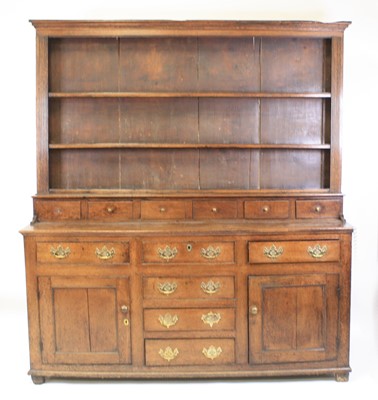 Lot 2408 - A George III joined oak dresser, the upper...