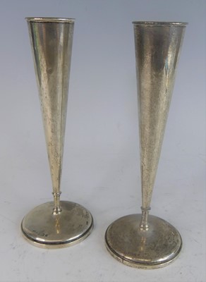Lot 81 - A pair of circa 1900 silver conical stem vases,...