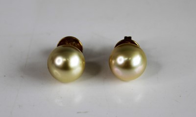 Lot 2153 - A pair of yellow metal Golden South Sea pearl...