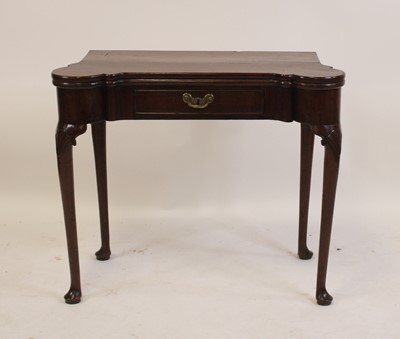 Lot 2407 - A George II red walnut card table, the...