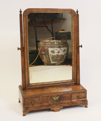 Lot 2467 - An early 18th century walnut dressing table...