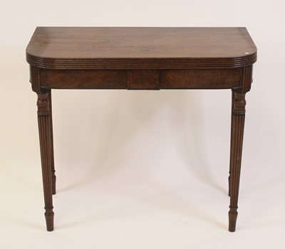 Lot 2413 - A George III mahogany tea table, the D-shaped...