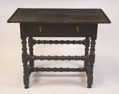 Lot 2392 - A circa 1700 joined oak single drawer side...