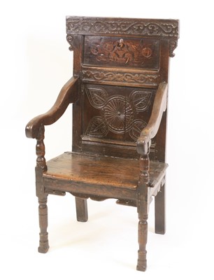 Lot 2465 - An antique joined oak Wainscot chair, having a...