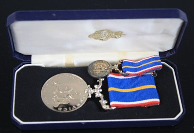 Lot 679 - A National Service medal, unnamed as issued...