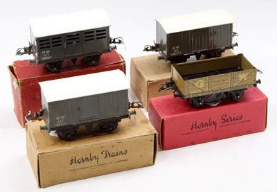 Lot 270 - Three post-war and one pre-war GW goods wagons....