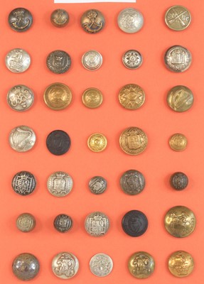 Lot 667 - A collection of military buttons being...