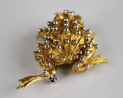 Lot 2176 - A yellow and white metal toad brooch, with...