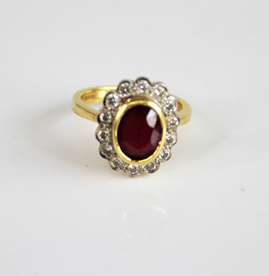 Lot 2243 - An 18ct yellow and white gold ruby and diamond...