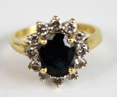 Lot 2568 - A yellow and white metal, sapphire and diamond...