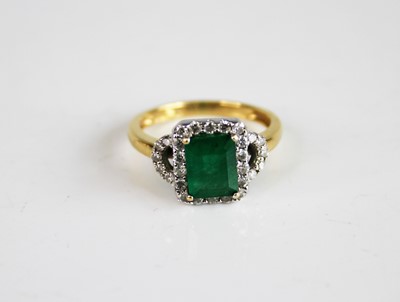 Lot 2170 - An 18ct yellow and white gold, emerald and...