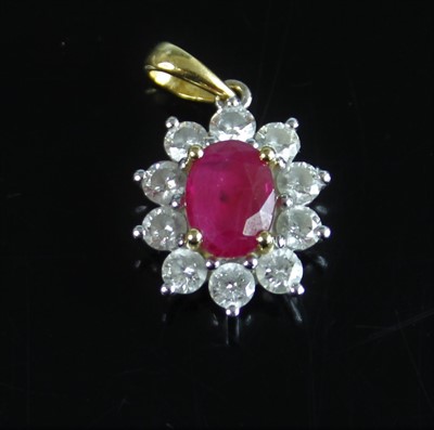 Lot 2184 - An 18ct yellow and white gold, ruby and...