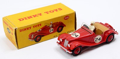 Lot 1128 - Dinky Toys 108 MG Midget, red body with red...