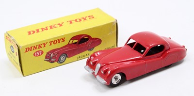 Lot 1143 - Dinky Toys No.157 Jaguar XK120 comprising red...