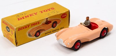 Lot 1127 - Dinky Toys 104 Aston Martin DB3S in salmon...