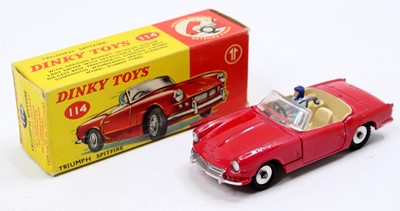 Lot 1152 - Dinky Toys, 114, Triumph Spitfire, red body,...