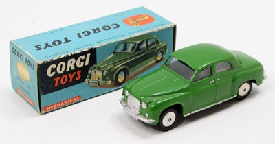 Lot 1282 - A Corgi Toys No. 204m Rover 90 saloon in green...