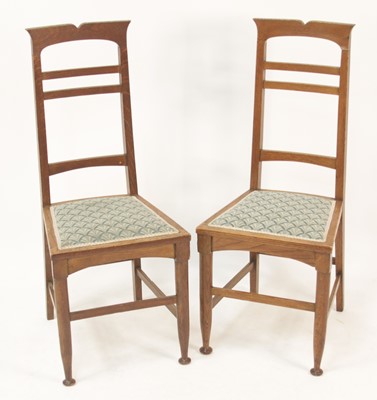 Lot 265 - A pair of Arts & Crafts oak bedroom chairs,...