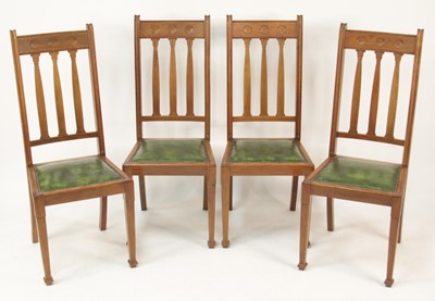 Lot 266 - A set of four early 20th century walnut dining...