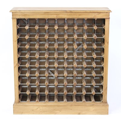 Lot 1536 - A pine 81 bottle capacity wine rack, w.99cm, h....