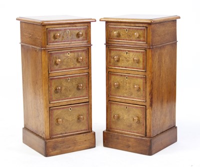 Lot 2425 - A pair of oak and burr oak four drawer bedside...