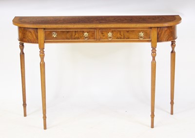 Lot 2460 - A walnut and figured walnut D-end hall...