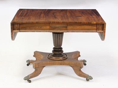 Lot 2416 - A late Regency rosewood pedestal sofa table,...