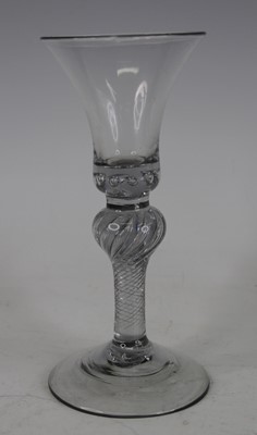 Lot 2072 - A wine glass, circa 1750, the bell shaped bowl...