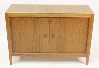 Lot 271 - A 1960s Gordon Russell double door teak 'Helix'...