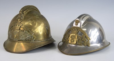 Lot 754 - A French brass fire helmet in the Adrian...