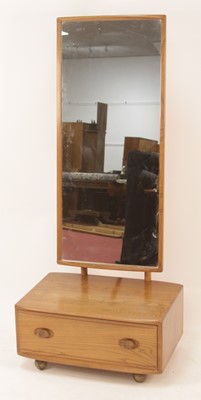 Lot 316 - An Ercol 'Windsor' light elm floor mirror,...