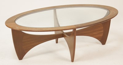 Lot 300 - A 1960s G-Plan teak oval 'Astro' coffee table,...