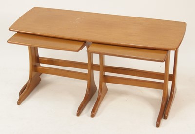 Lot 284 - A 1960s teak nest of three occasional...