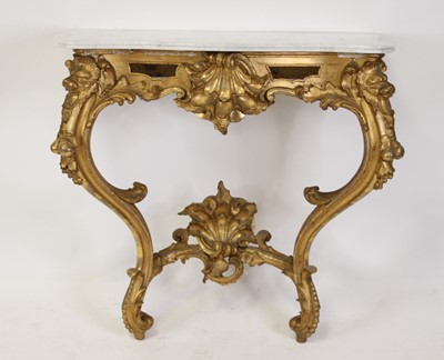 Lot 2445 - A Rococo Revival giltwood and gesso console...