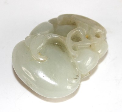 Lot 2274 - A Chinese carved pale celadon jade 'double...