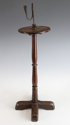 Lot 2226 - A 17th century wrought iron rush light holder,...