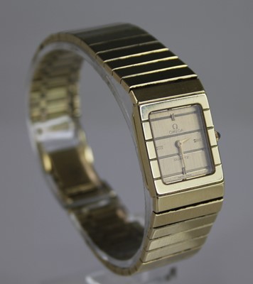 Lot 2219 - A lady's Omega 14ct gold cased quartz bracelet...