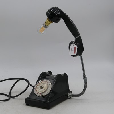 Lot 3 - A black bakelite cased rotary dial telephone,...