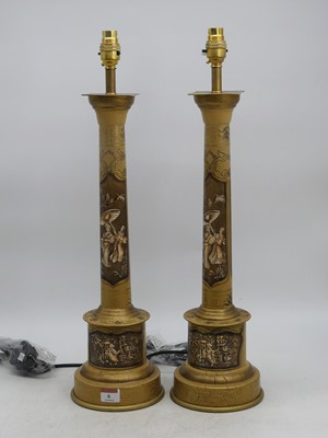Lot 6 - A pair of table lamps, each in the form of a...